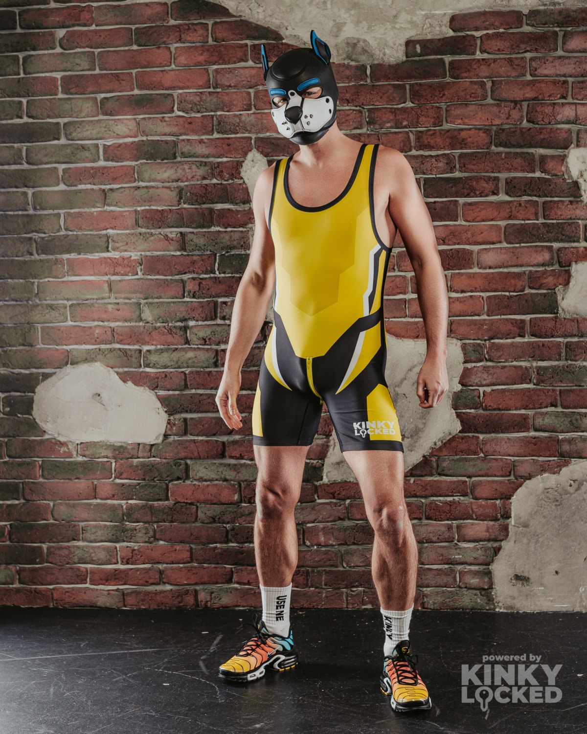 Full front view of KINKY LOCKED High-Voltage Yellow Wrestling Singlet