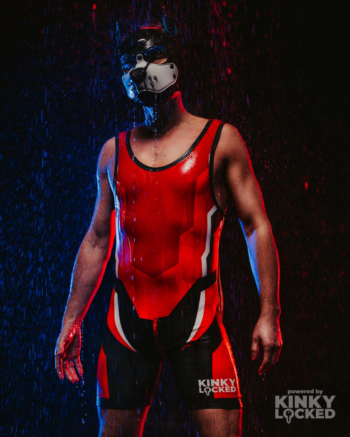 KINKY LOCKED Dominant Red Wrestling Singlet under dramatic club lighting