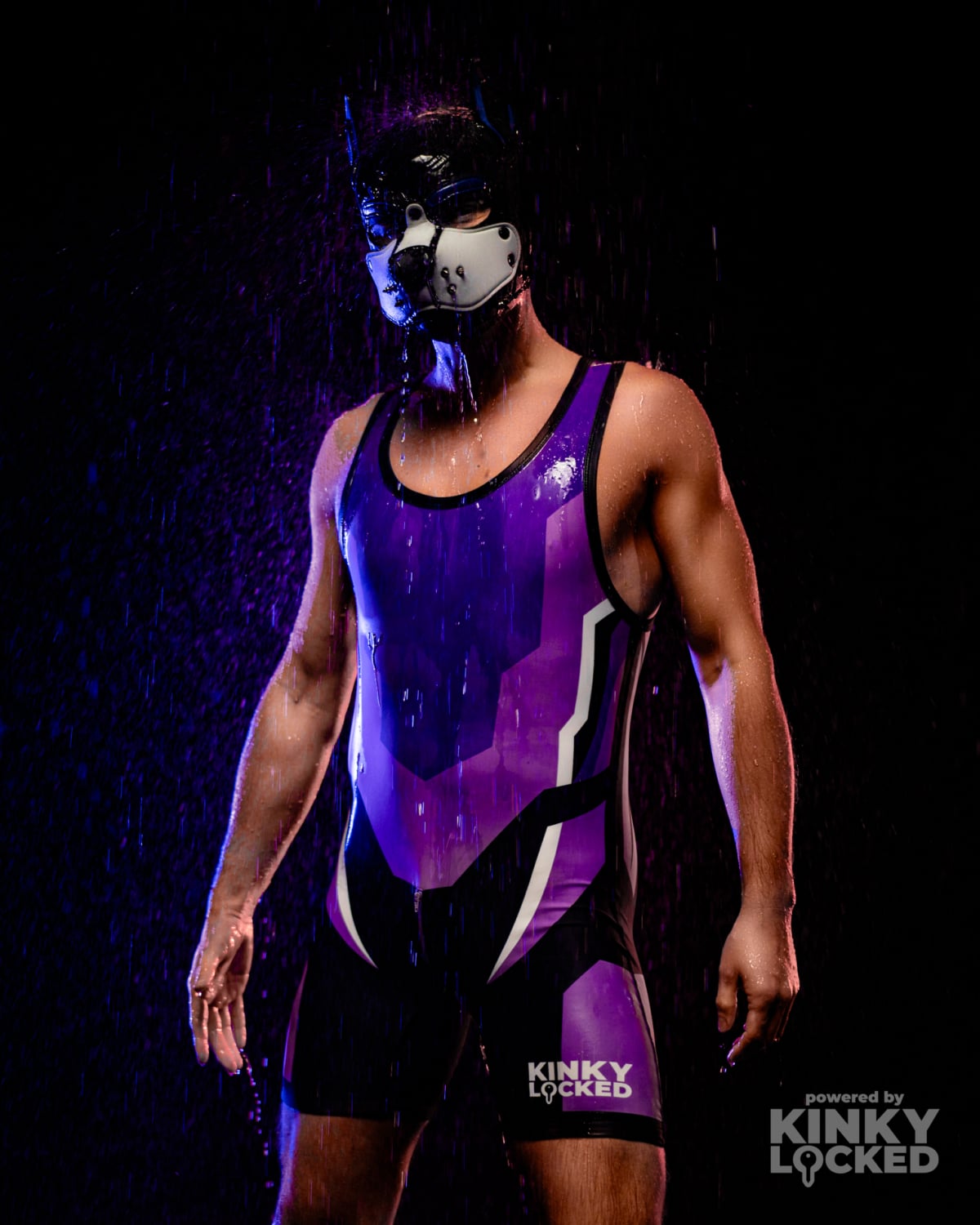 KINKY LOCKED Electric Purple Wrestling Singlet under dramatic club lighting