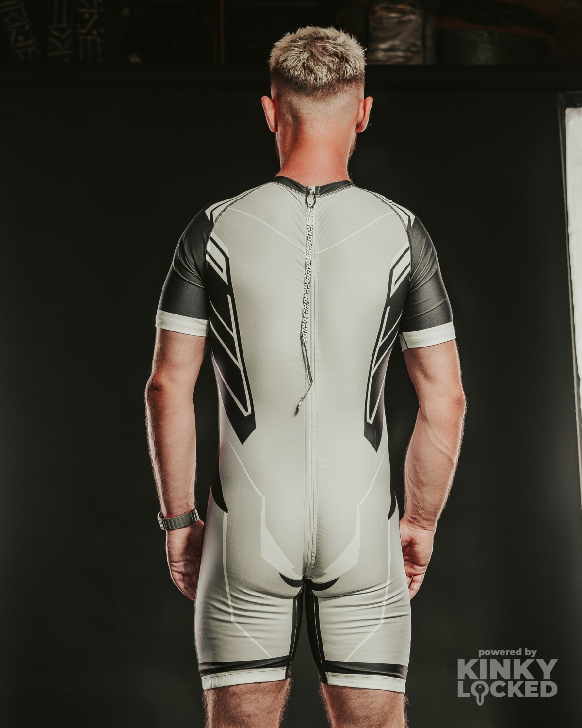 Rear view of the Cold Gray Surfsuit showing the long zipper and branded pull cord