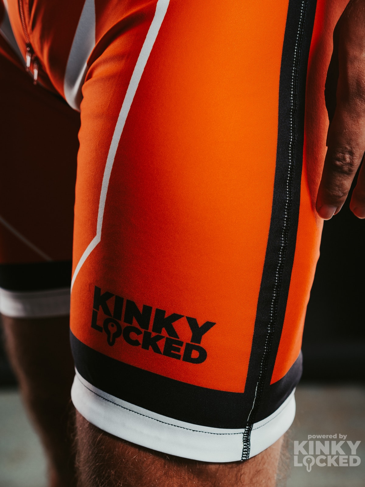 SURFSUIT SPANDEX KINKY LOCKED - NEON ORANGE ZIPPER 15 KINKYLOCKED SURFSUIT 25 z 26 KINKY LOCKED - FETISH GEAR FOR EVERYONE